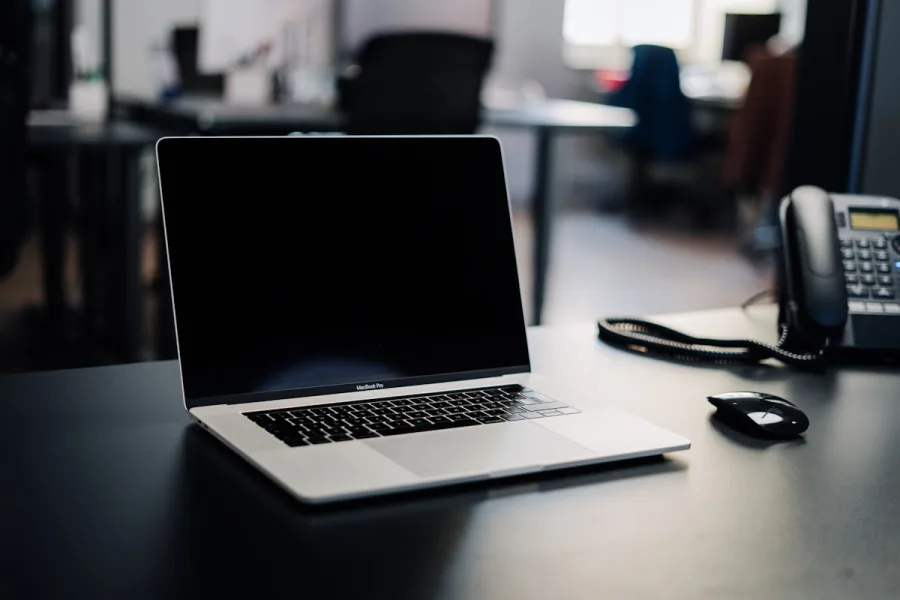 Team member joining a remote video call from a home working setup