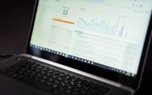 Laptop showing an advertising analytics dashboard used to manage Amazon ACoS