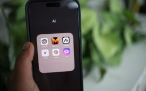 Hand holding a smartphone showing an AI assistant used to research product recommendations