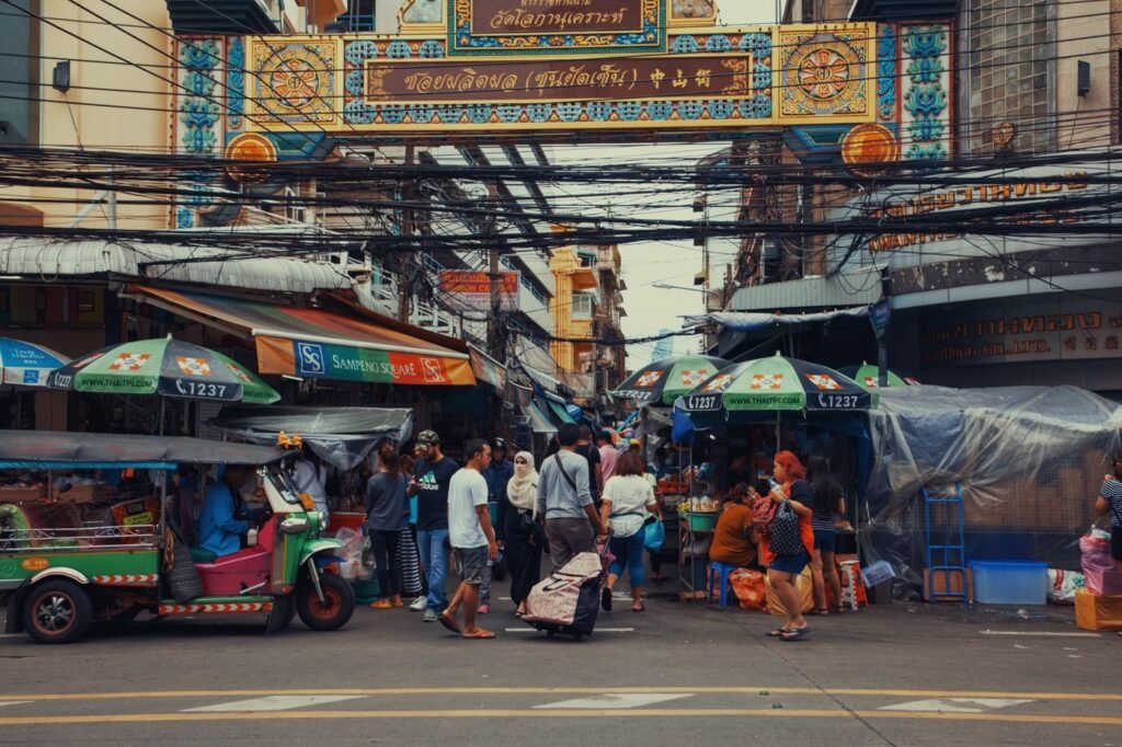 Shoppers browsing stalls at a regional bazaar