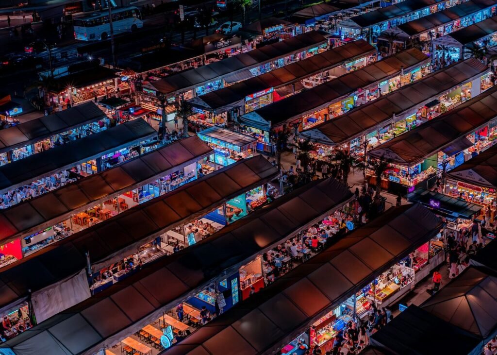 Aerial view of a busy night market in Bangkok