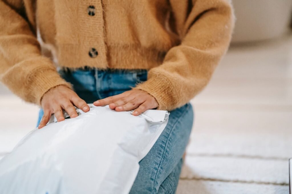 Customer unpacking an online order in an apartment