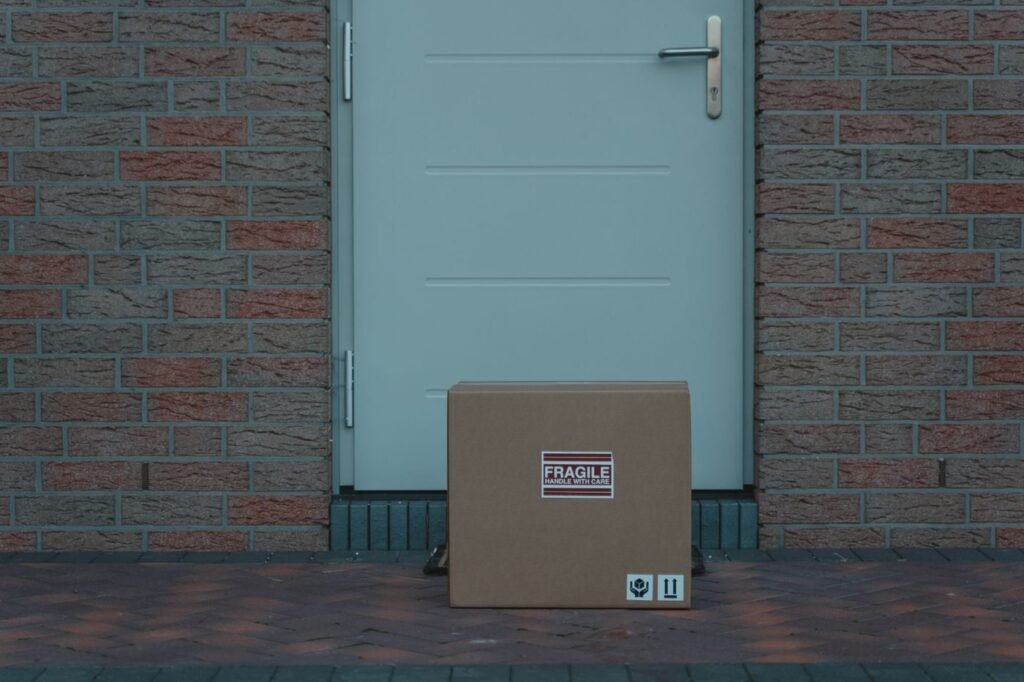 Parcel left at a doorway marked fragile