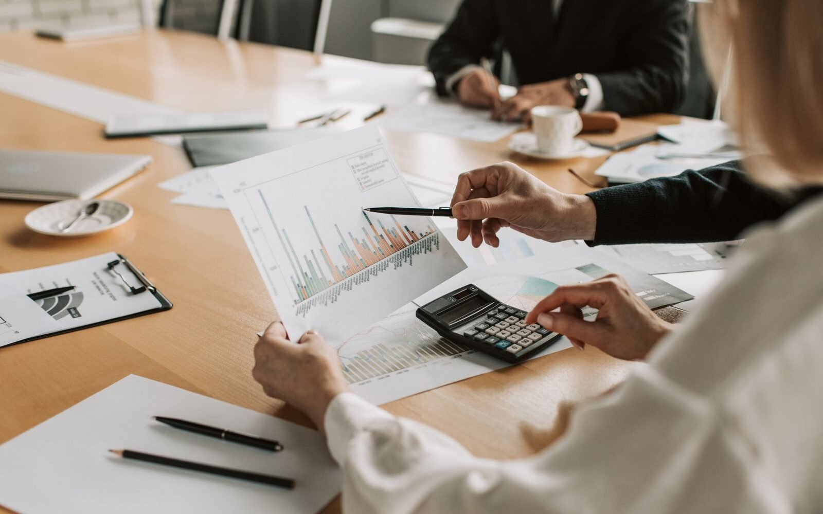 Senior strategists reviewing eCommerce performance charts during an audit session