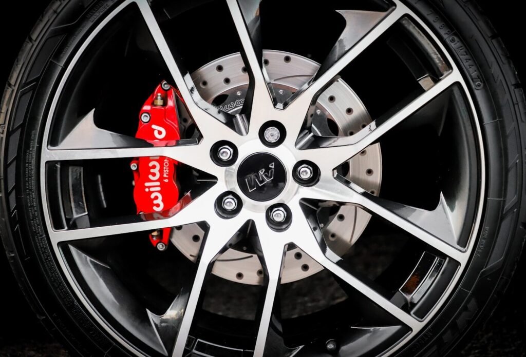 A vehicle wheel and tyre viewed close up