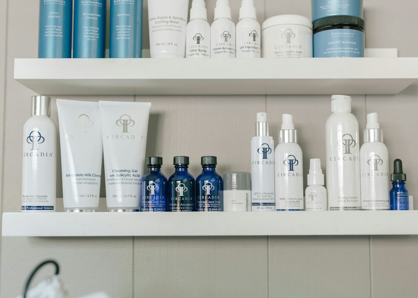 Shelves stocked with skincare and cosmetics products
