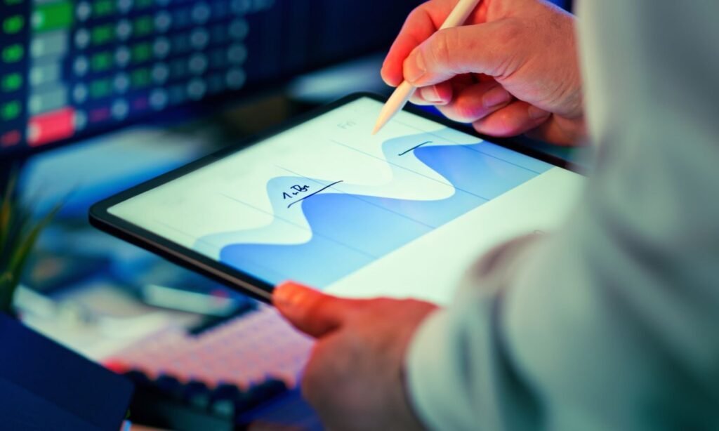 Analyst reviewing eCommerce performance charts on a tablet