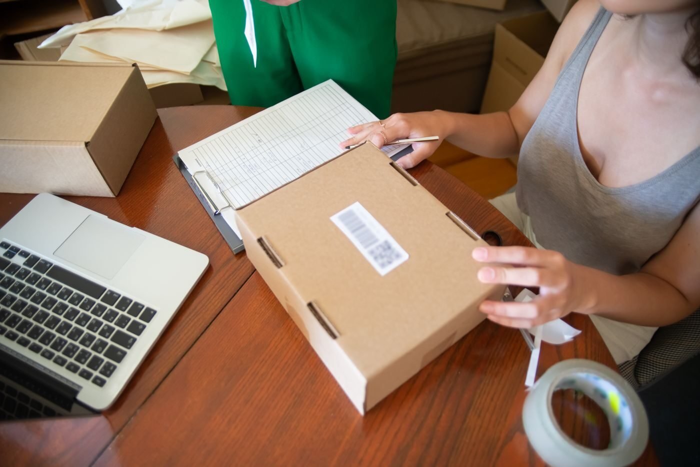 Team packing online orders in a Canadian eCommerce workspace