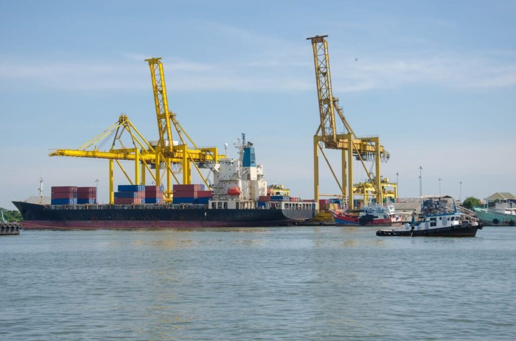 Container ship at an industrial harbour ready for export
