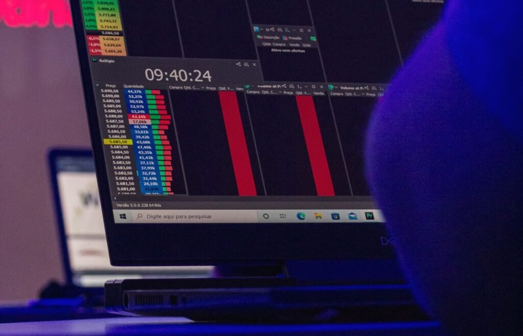 Analyst reviewing experiment results on a laptop during a conversion test readout