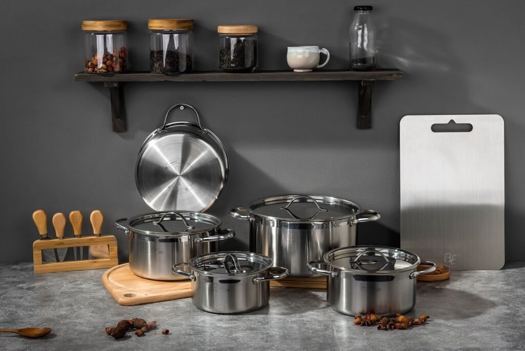 Modern stainless steel kitchenware set styled for an online store