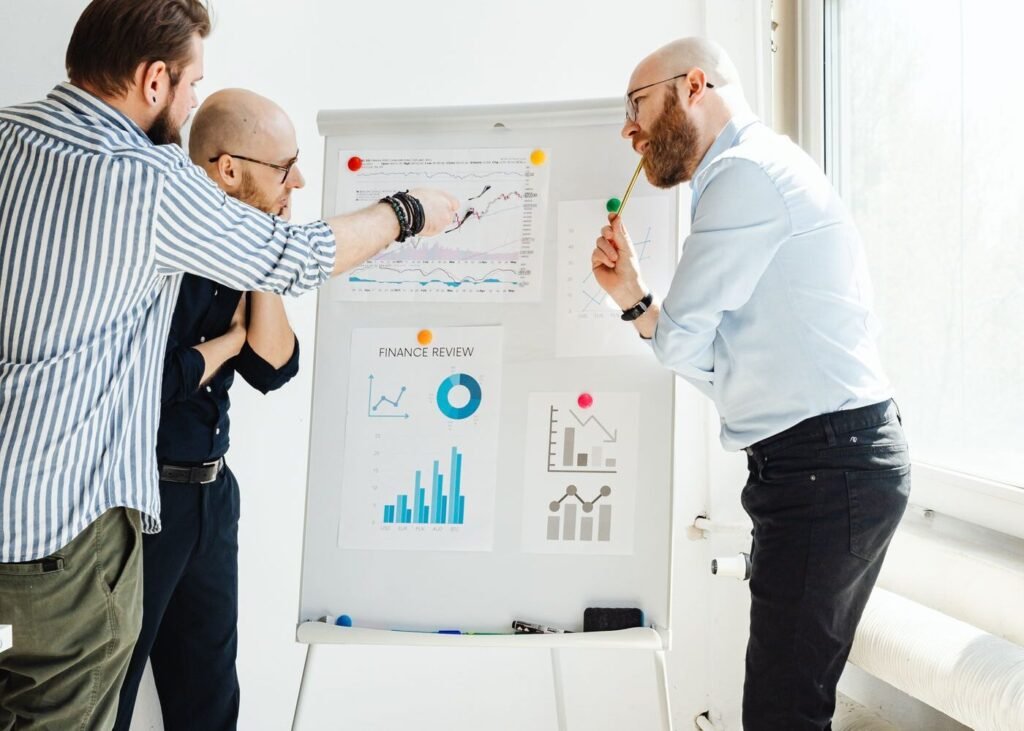 Team reviewing subscription cohort charts in a meeting