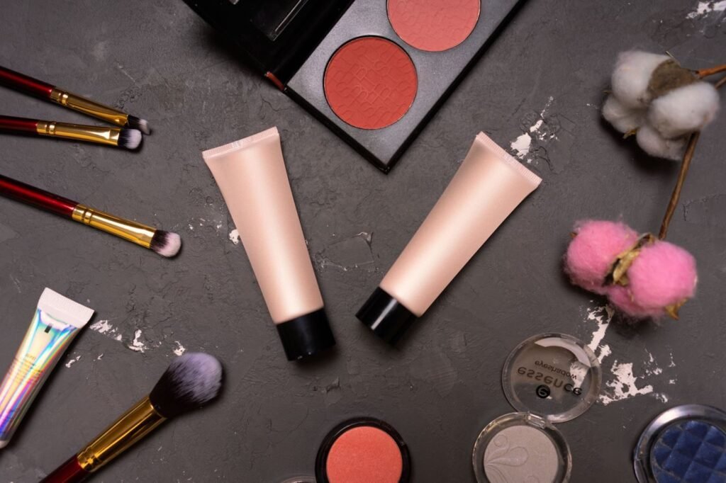 Cosmetics and creams photographed on a dark background