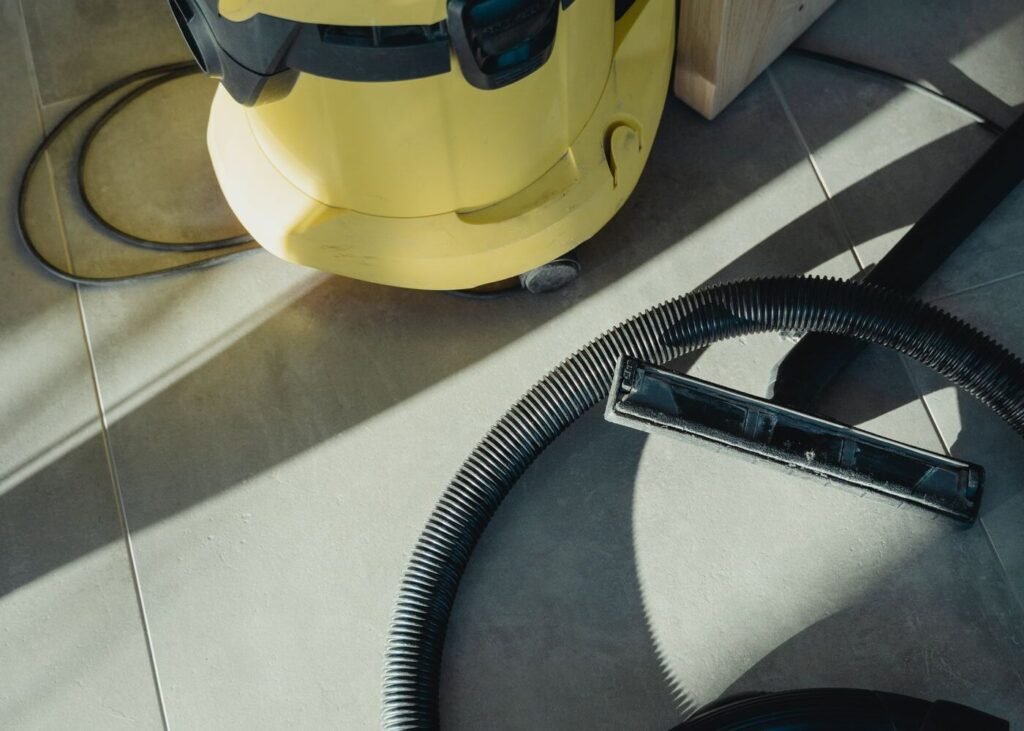 Industrial vacuum cleaner on a tiled floor
