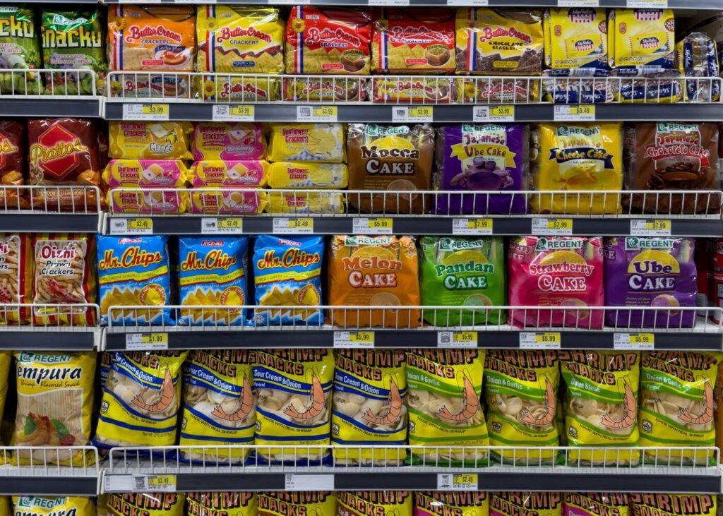 Packaged snacks and food items on a store shelf