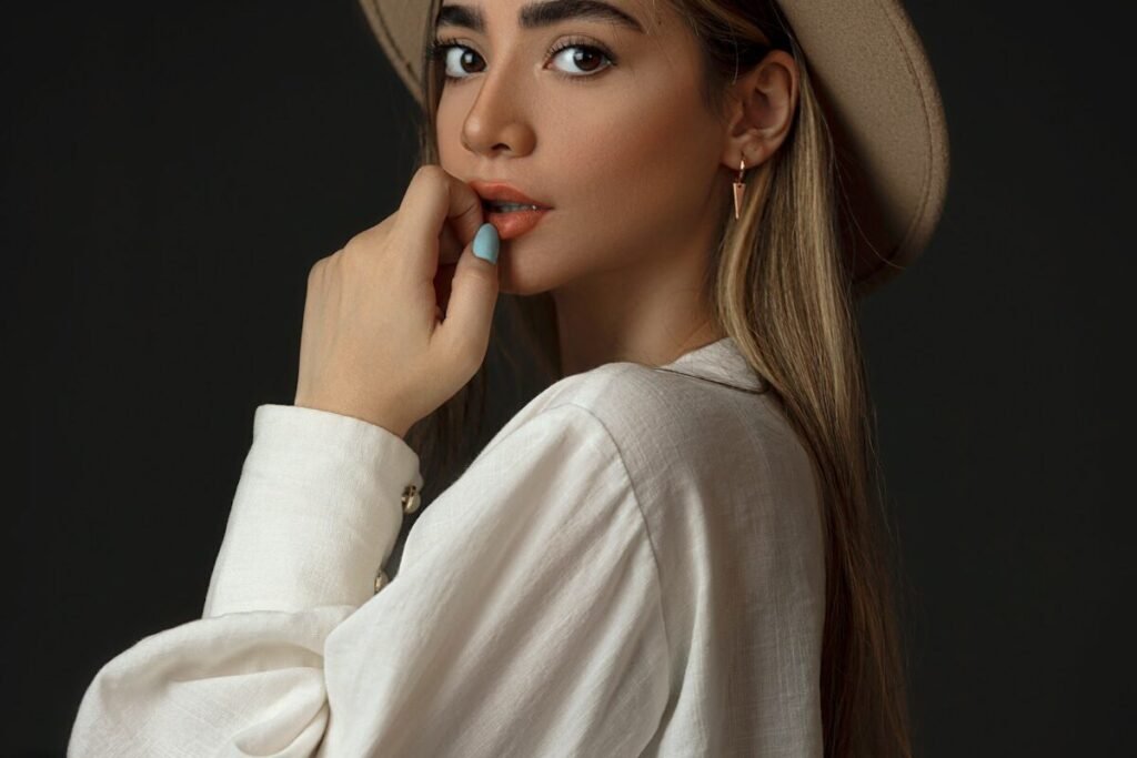A model in a shirt and hat