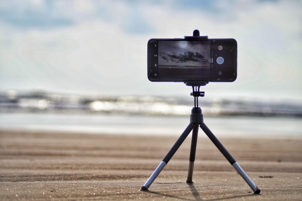 A smartphone set up to film