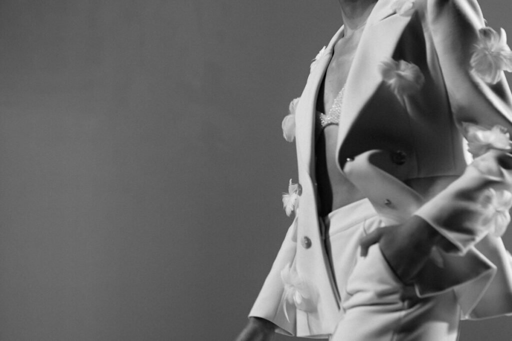 A studio shot of a white dress