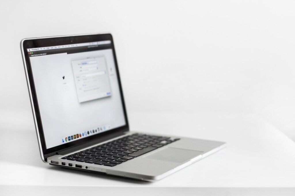 A laptop on a plain surface