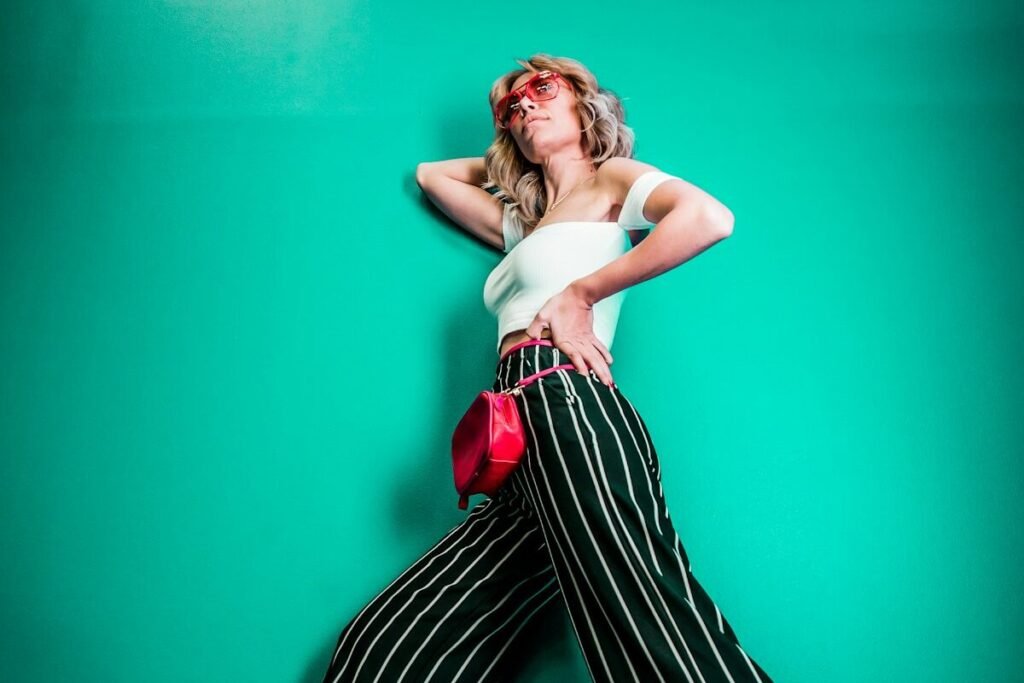 A model posing in a sleeveless top
