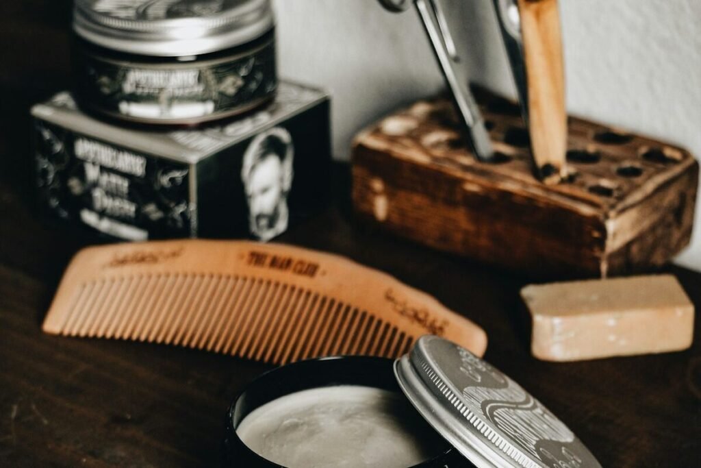 A grooming tool on a wooden board