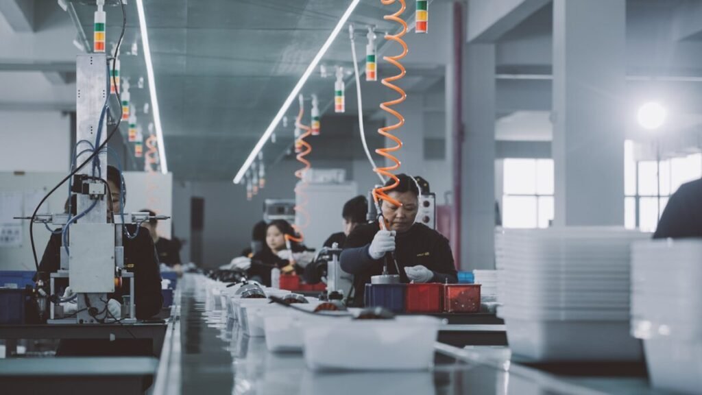 A team working on a factory floor