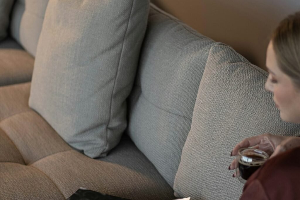 Someone relaxing at home with a magazine