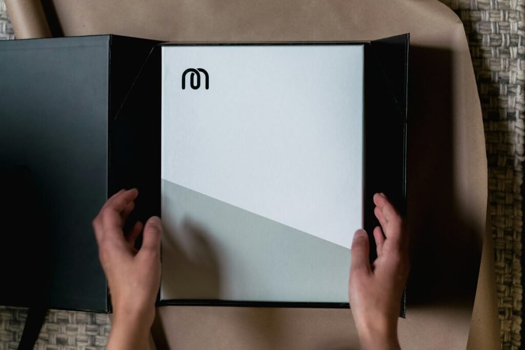 A monochrome product box on fabric