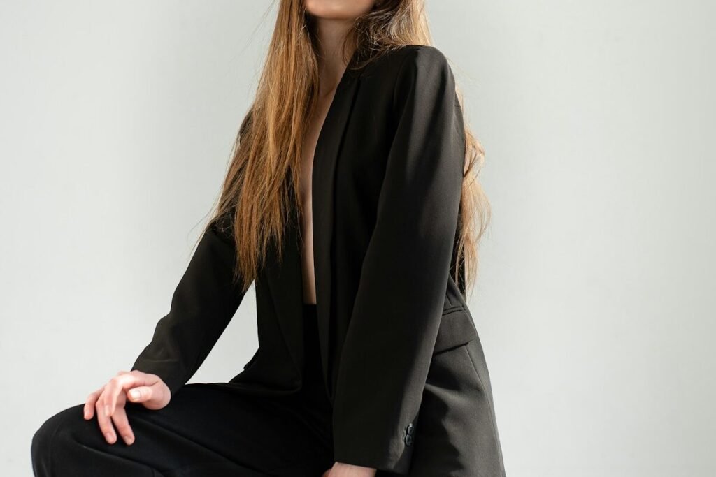 A seated studio fashion shot