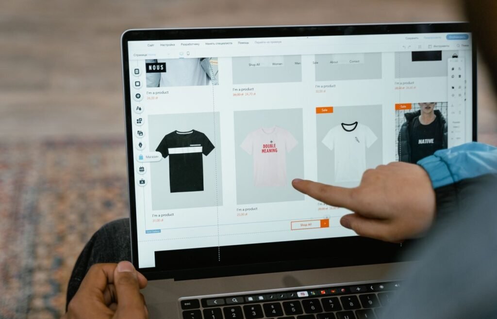 Person comparing product options on an online store collection page