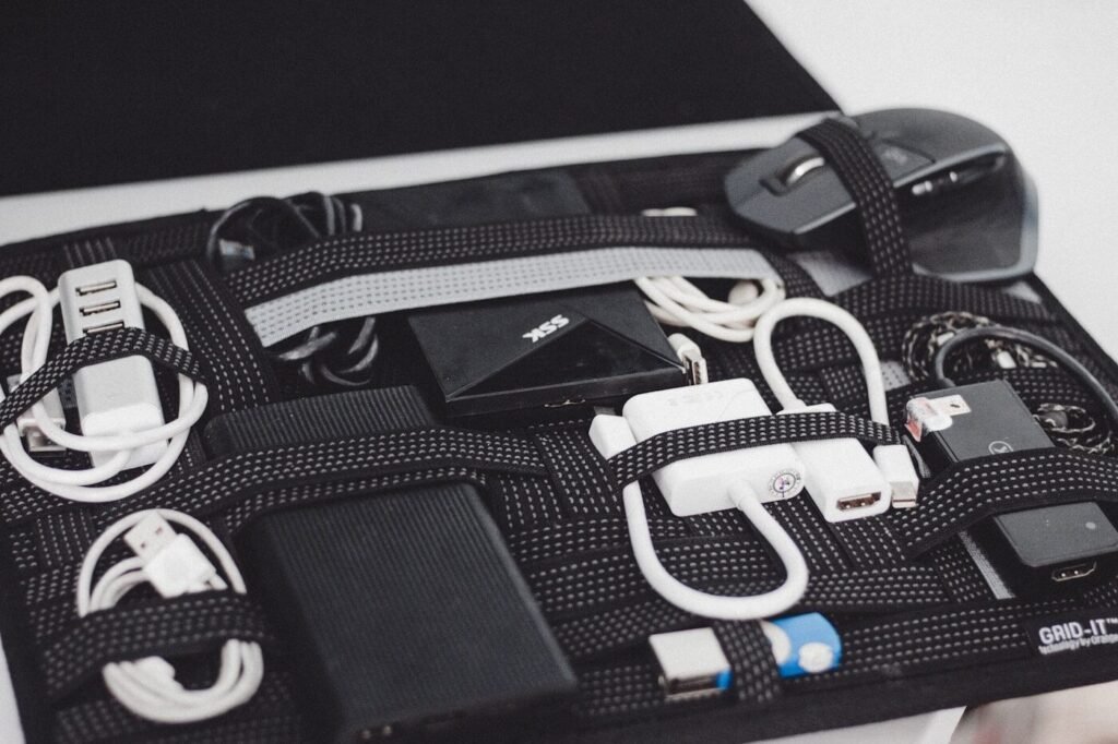 A case filled with cables and electronic accessories