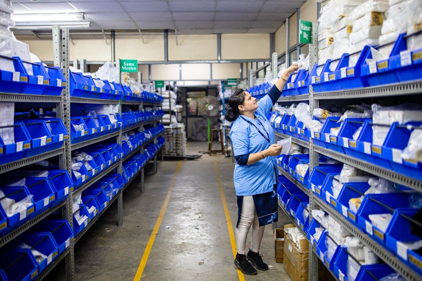 Warehouse operative organising inventory in a European fulfilment centre