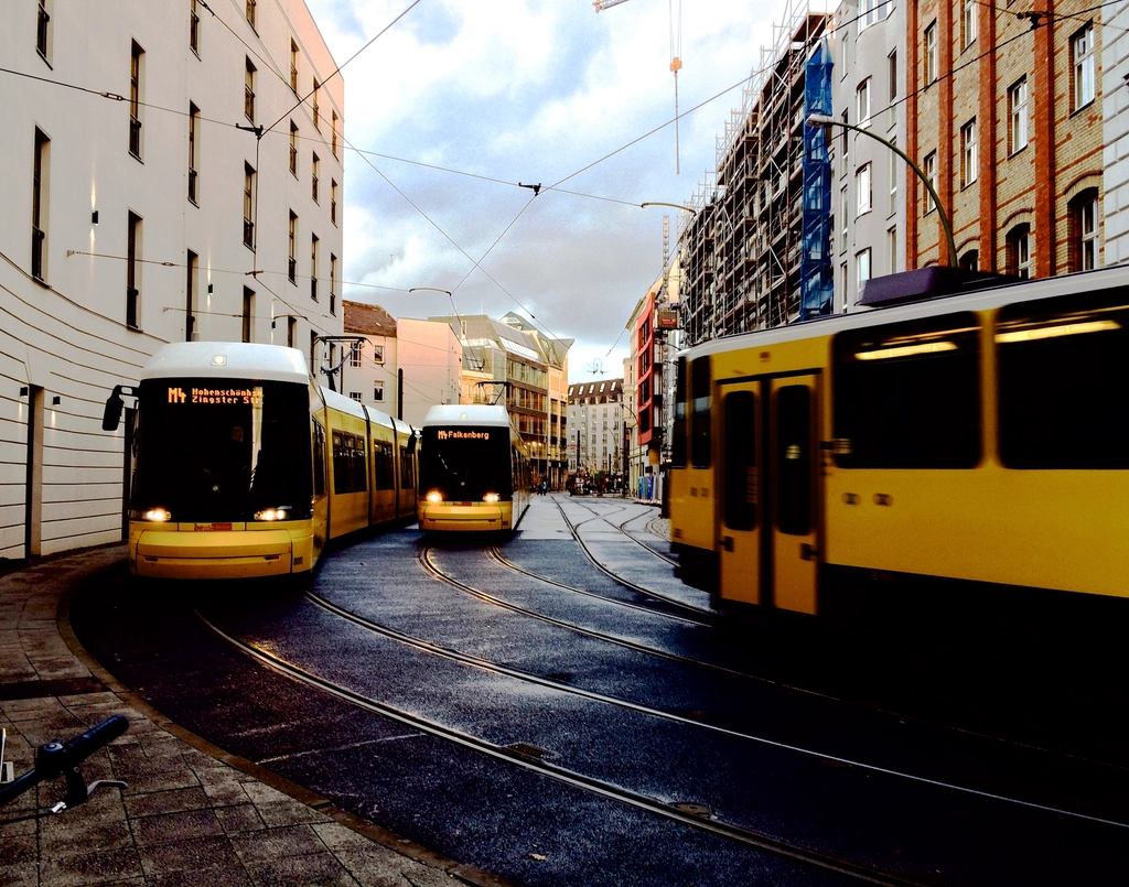 Streetcars on a European city corner representing language and market localisation