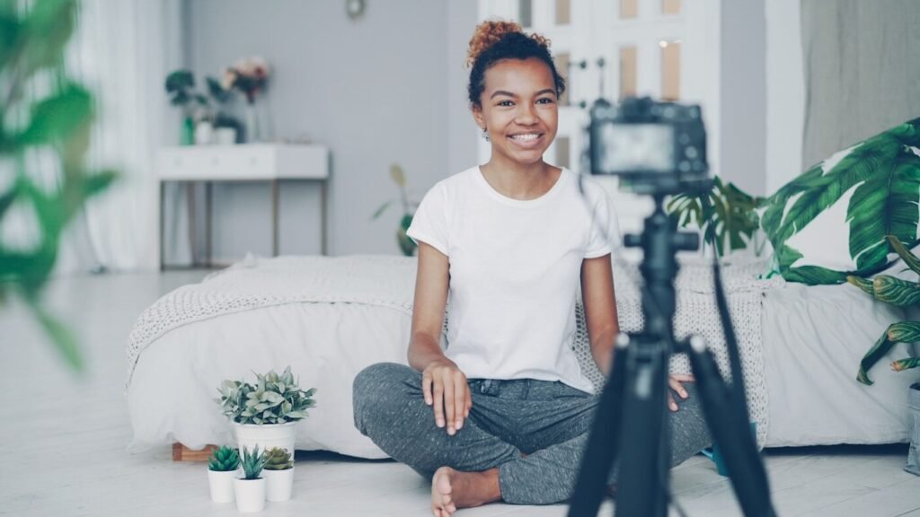 Creator filming a fashion video on a camera
