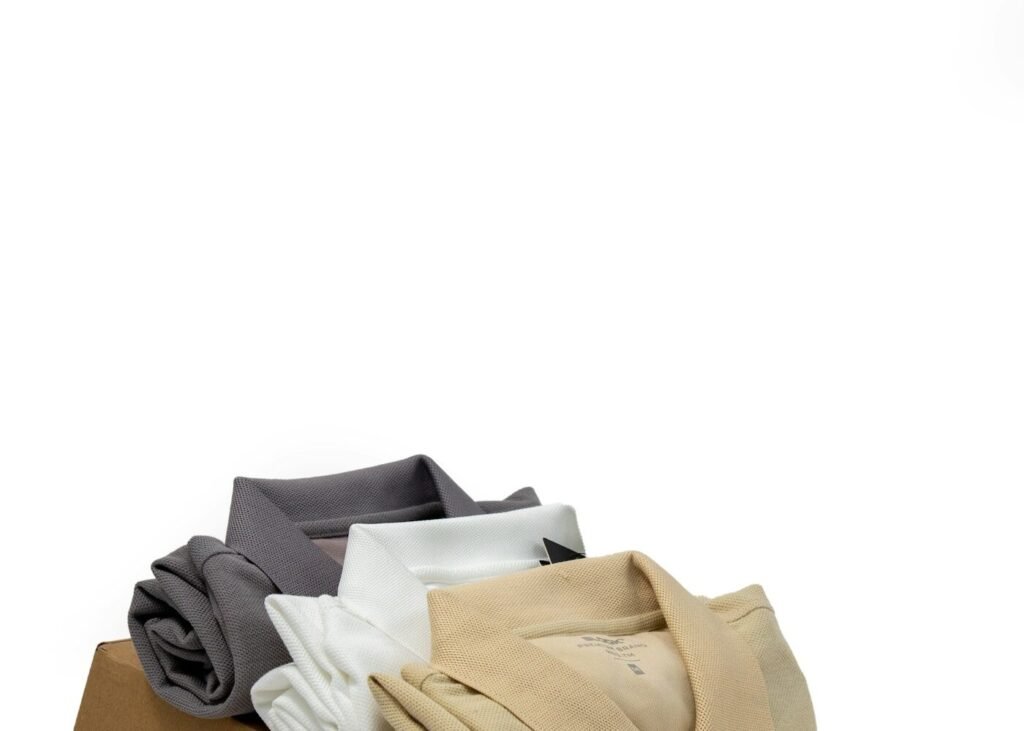 Folded clothing packed into a box ready for delivery or return