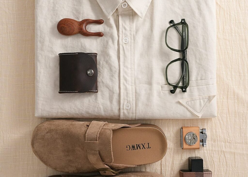 Flat lay of apparel and accessories styled for a product shoot