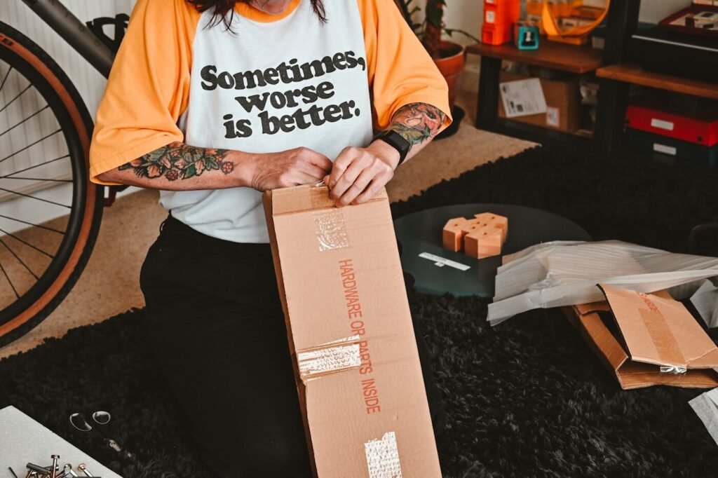 Customer opening a fashion parcel at home