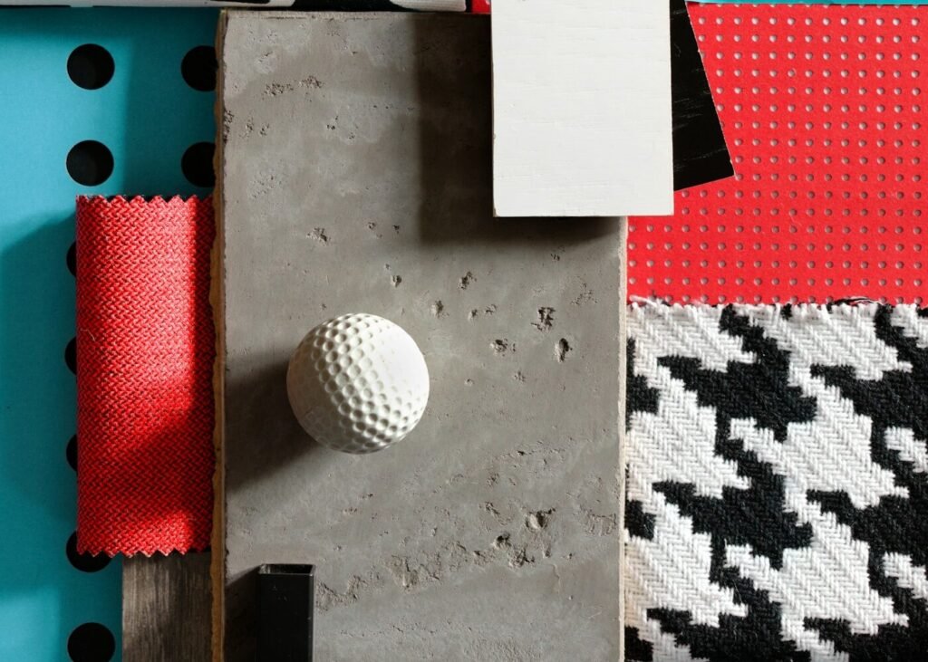 A table covered with fabric and material samples