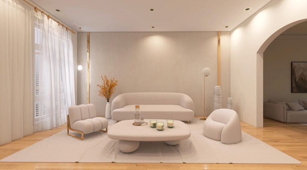 A styled living room with a white sofa and armchairs