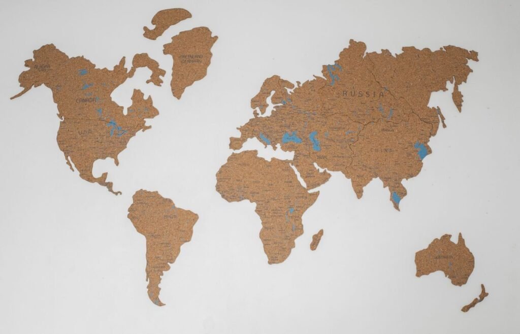 Laptop showing a world map while planning localised store experiences