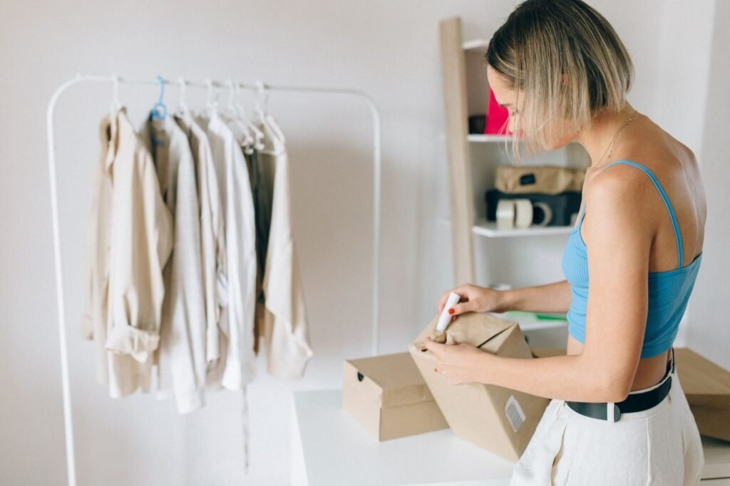 Customer holding a delivered cardboard box