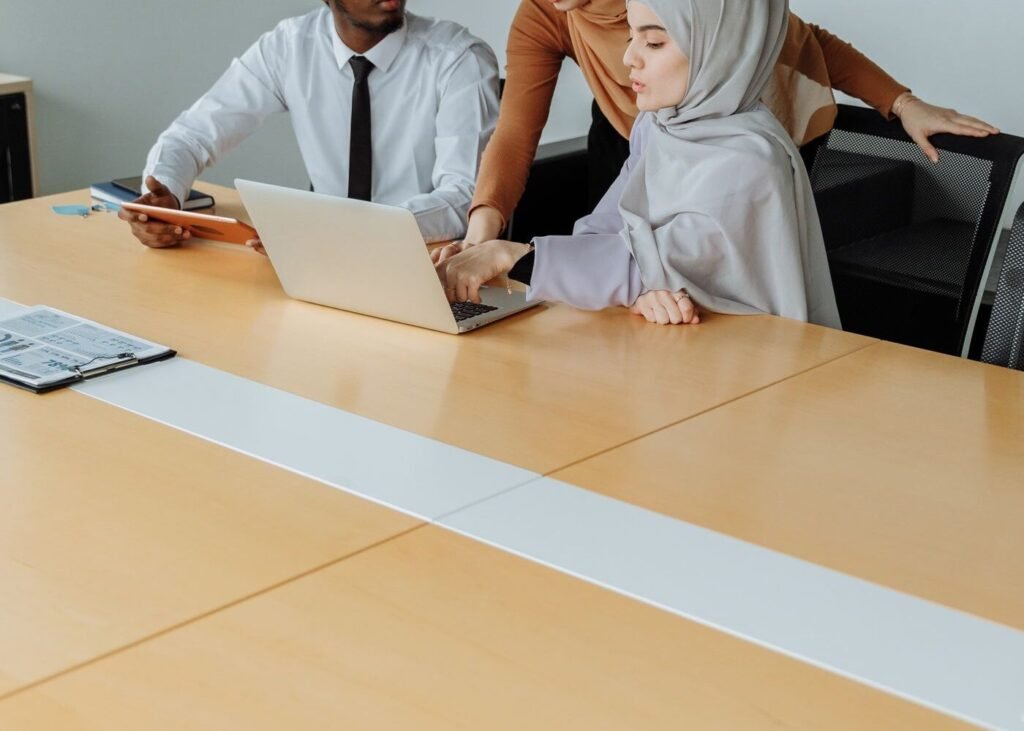 Colleagues reviewing market plans in an office