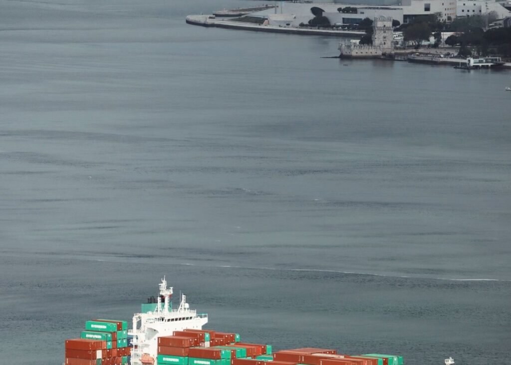 Cargo ship navigating a regional harbour