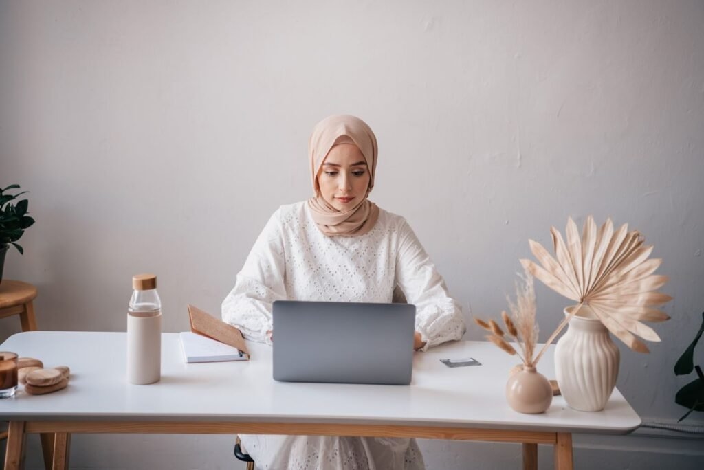 Shopper comparing products on a laptop in a home office