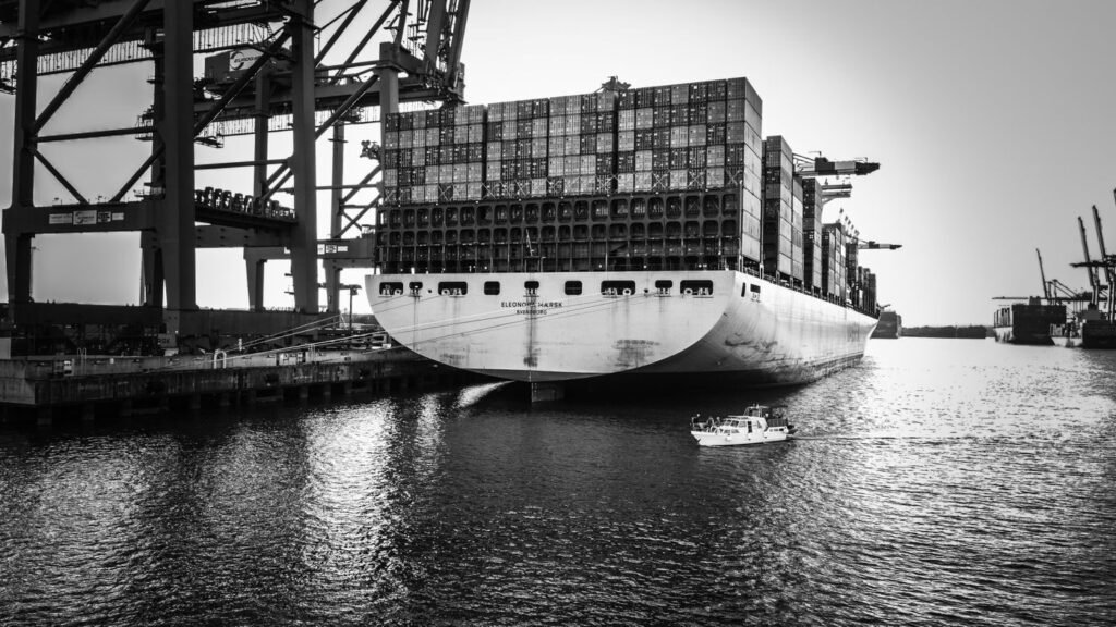 Container ship at sea carrying export cargo