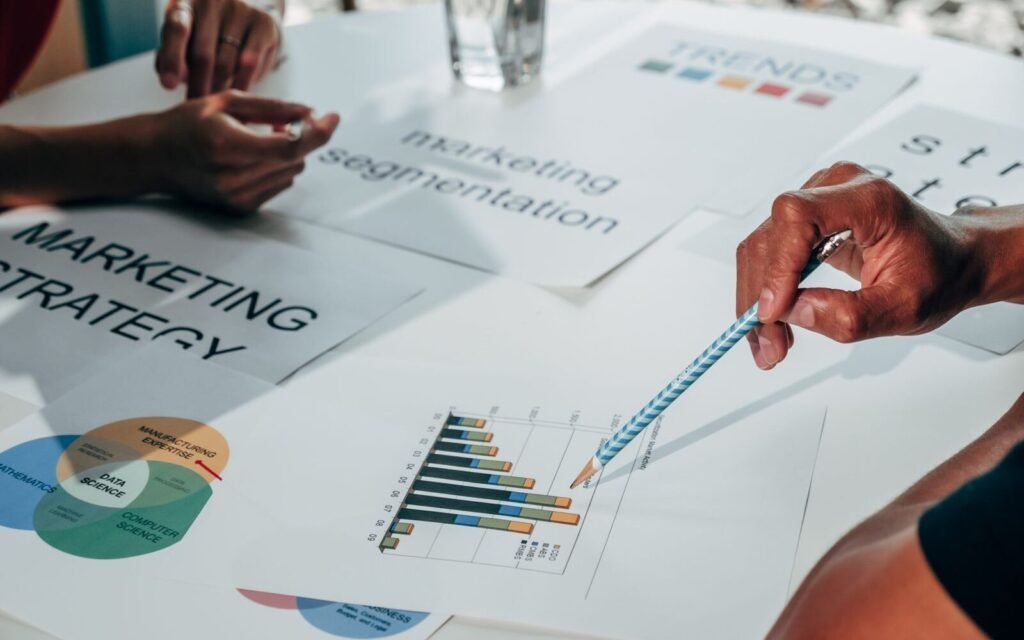 eCommerce marketing team reviewing channel performance charts in a planning meeting