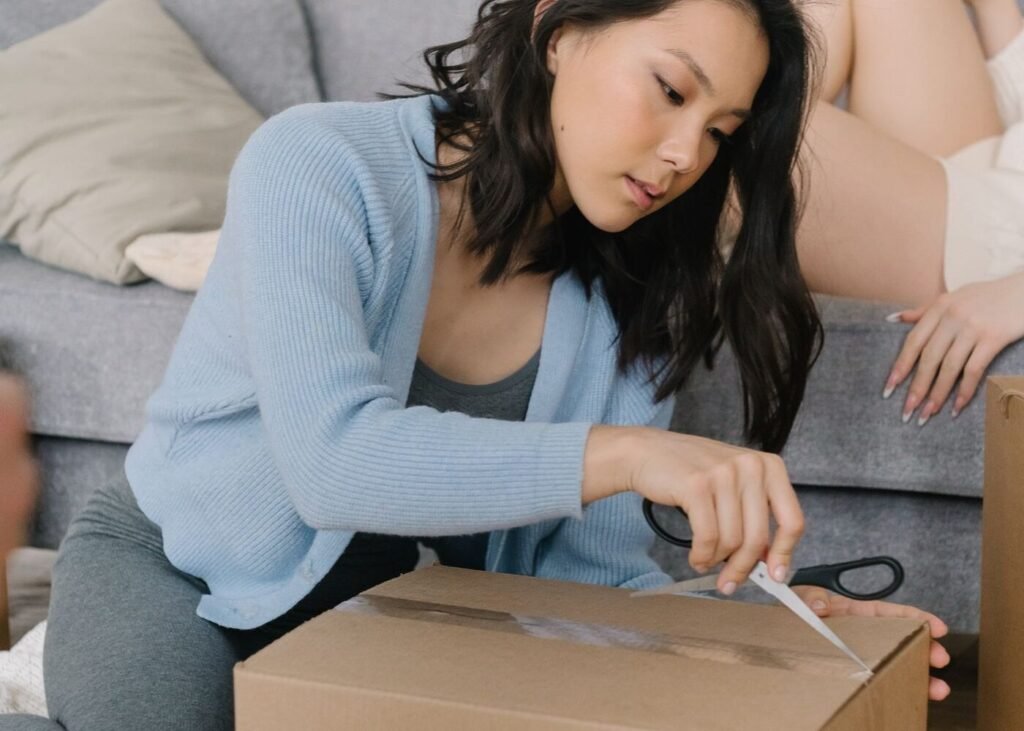 Customer opening a delivered order at home