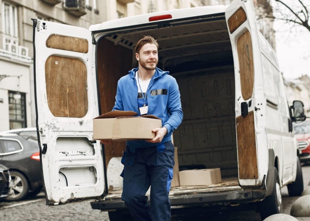 Courier carrying parcels for last-mile delivery