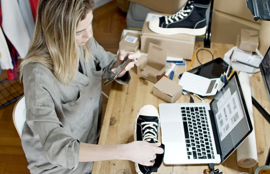 Merchant photographing a product for an online store product page