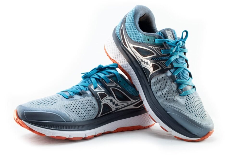 A pair of running shoes on a plain background